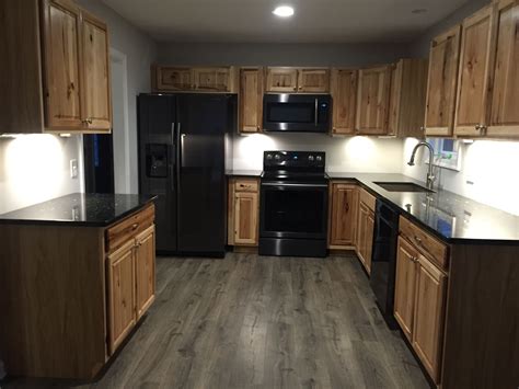 picture of wood cabinets and black stainless steel appliacne|black stainless steel kitchen colors.